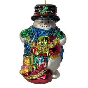 Charming hand-blown mercury glass snowman candle holder.